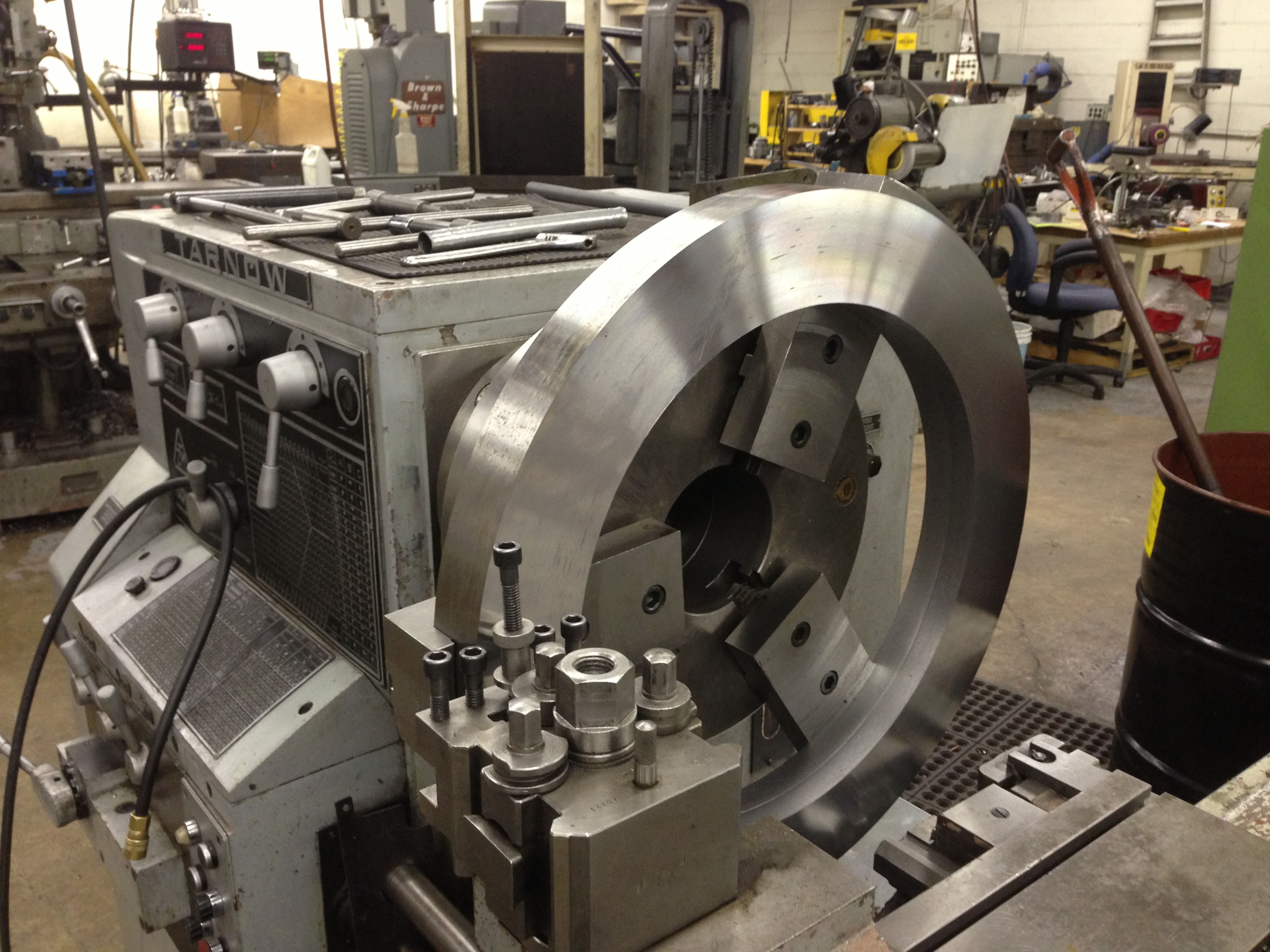 Large ring fixture running on a manual lathe in the KielMech shop